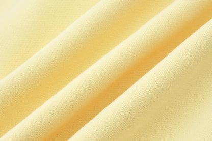 13DE MARZO Lollipop Wrapper Cropped Hoodie Yellow - 13DE MARZO