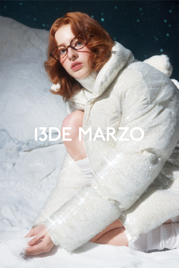 13DE MARZO SKI campaign: soft white layers in a snowy setting